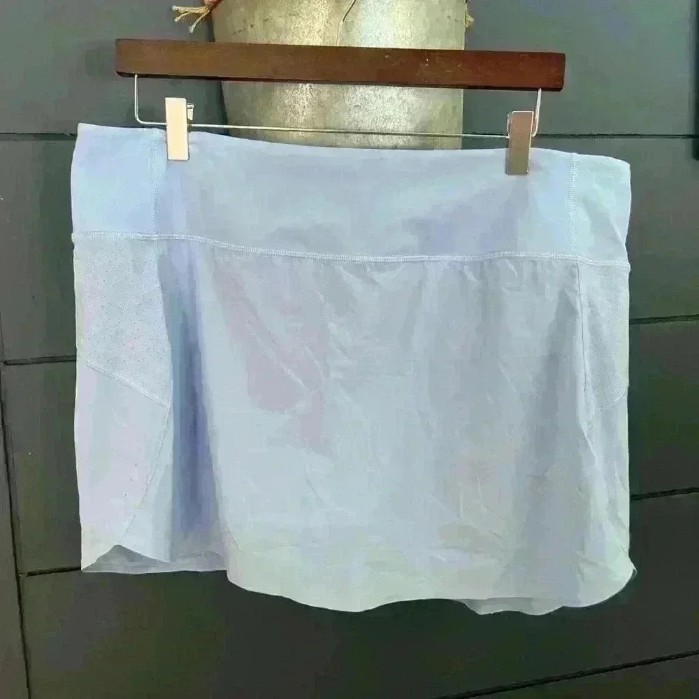 Athleta Run with it 14” skort Swallowtail blue xl